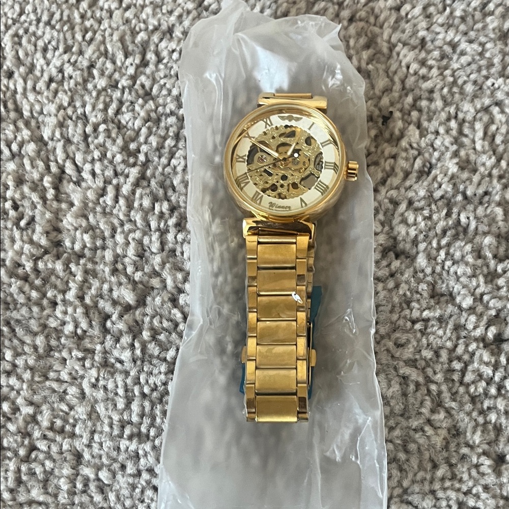 Gold Skeleton Watch